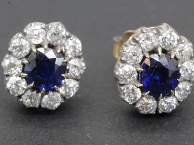 Stunning sapphire and diamond earrings with gold settings, perfect for special occasions.