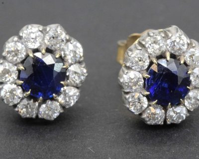 Stunning sapphire and diamond earrings with gold settings, perfect for special occasions.