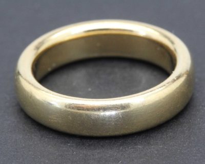 Gold wedding band ring, perfect for engagement or wedding jewelry.