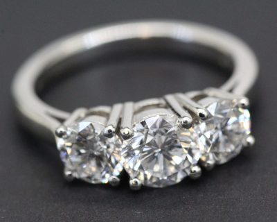 Elegant diamond ring with four brilliant-cut stones for special occasions.