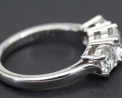 Elegant diamond engagement ring with a sleek silver band and sparkling stones. Perfect for special o.