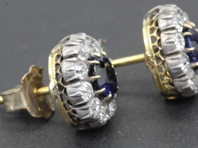 Gold and silver earrings with sapphires and diamonds for women.