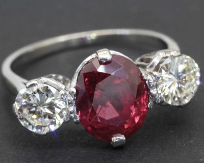 Ruby and diamond three stone