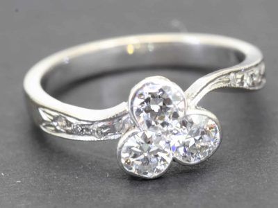 Elegant silver ring featuring three sparkling gemstones, perfect for special occasions or everyday w.