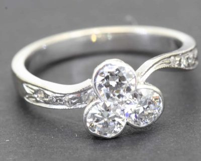 Elegant silver ring featuring three sparkling gemstones, perfect for special occasions or everyday w.