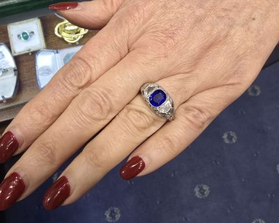 Elegant sapphire ring on a woman's hand at Weldons Jewellers.