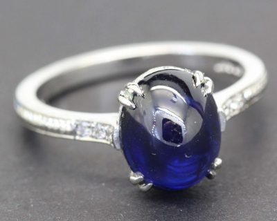 Elegant sapphire and diamond ring for engagement or special occasions.