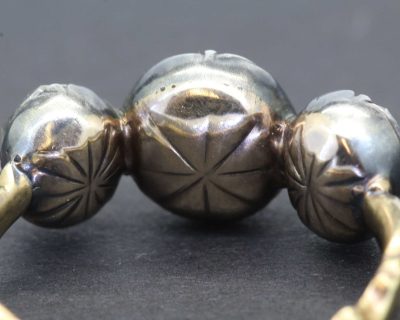 Vintage silver and gold ring with floral design, perfect for jewelry collectors.
