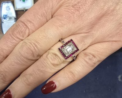 Diamond and ruby engagement ring with a square design, crafted by Weldons Jewellers.