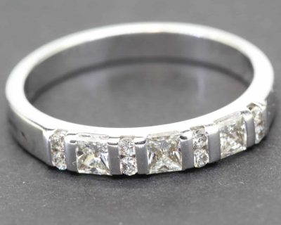 Elegant diamond eternity ring in white gold with sparkling stones.