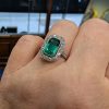 Emerald and diamond ring on hand