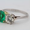 Colombian emerald and diamond three stone ring, side view