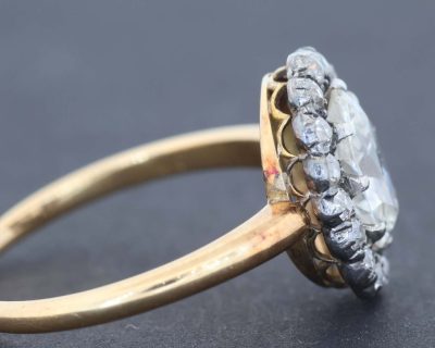 An extremely rare antique Irish cluster ring, combining the distinctive character of antique Irish jewellery with the enduring elegance of the classic diamond cluster. The ring is presented in its original Wests box, adding an especially appealing period detail to this exceptional jewel.