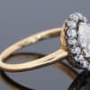 An extremely rare antique Irish cluster ring, combining the distinctive character of antique Irish jewellery with the enduring elegance of the classic diamond cluster. The ring is presented in its original Wests box, adding an especially appealing period detail to this exceptional jewel.