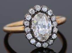 An extremely rare antique Irish cluster ring, combining the distinctive character of antique Irish jewellery with the enduring elegance of the classic diamond cluster. The ring is presented in its original Wests box, adding an especially appealing period detail to this exceptional jewel.
