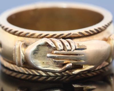 A rare and evocative Georgian “Mane in Fede” memorial ring, made in 1774. The name Mane in Fede refers to the traditional motif of two clasped hands, symbolising faith, fidelity and enduring affection. Memorial rings of this type formed an intimate connection between jewellery and remembrance, often incorporating a lock of the deceased’s hair as a tangible keepsake. This example is particularly intriguing for its ingenious concealed compartment.
