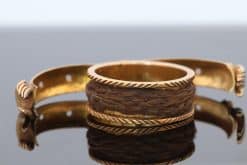 A rare and evocative Georgian “Mane in Fede” memorial ring, made in 1774. The name Mane in Fede refers to the traditional motif of two clasped hands, symbolising faith, fidelity and enduring affection. Memorial rings of this type formed an intimate connection between jewellery and remembrance, often incorporating a lock of the deceased’s hair as a tangible keepsake. This example is particularly intriguing for its ingenious concealed compartment.