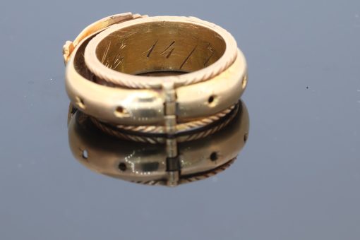 A rare and evocative Georgian “Mane in Fede” memorial ring, made in 1774. The name Mane in Fede refers to the traditional motif of two clasped hands, symbolising faith, fidelity and enduring affection. Memorial rings of this type formed an intimate connection between jewellery and remembrance, often incorporating a lock of the deceased’s hair as a tangible keepsake. This example is particularly intriguing for its ingenious concealed compartment.