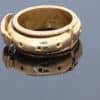 A rare and evocative Georgian “Mane in Fede” memorial ring, made in 1774. The name Mane in Fede refers to the traditional motif of two clasped hands, symbolising faith, fidelity and enduring affection. Memorial rings of this type formed an intimate connection between jewellery and remembrance, often incorporating a lock of the deceased’s hair as a tangible keepsake. This example is particularly intriguing for its ingenious concealed compartment.