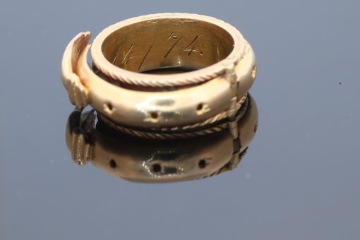 A rare and evocative Georgian “Mane in Fede” memorial ring, made in 1774. The name Mane in Fede refers to the traditional motif of two clasped hands, symbolising faith, fidelity and enduring affection. Memorial rings of this type formed an intimate connection between jewellery and remembrance, often incorporating a lock of the deceased’s hair as a tangible keepsake. This example is particularly intriguing for its ingenious concealed compartment.