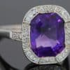 A magnificent 5-carat Siberian amethyst and diamond cluster ring, beautifully presented in platinum. The impressive scale and rich colour of the amethyst make this a particularly striking jewel, with the cool brilliance of the surrounding diamonds creating a refined contrast. Siberian amethyst is prized for its distinctive deep violet colour, and a stone of this substantial size makes a memorable centrepiece for a fine antique or vintage jewellery collection.