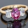 Pink sapphire and diamond three stone ring