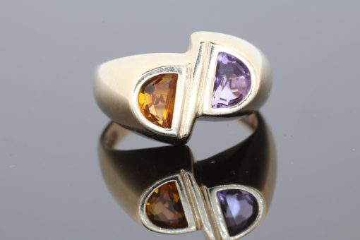 Distinctive and contemporary in spirit, this modernist two-stone ring celebrates the beauty of contrasting gemstones and unconventional design. Its asymmetrical composition reflects a sculptural approach to jewellery, creating a piece with individuality and artistic character.