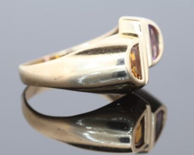 Distinctive and contemporary in spirit, this modernist two-stone ring celebrates the beauty of contrasting gemstones and unconventional design. Its asymmetrical composition reflects a sculptural approach to jewellery, creating a piece with individuality and artistic character.