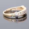 Elegant and versatile, this diamond band combines the timeless appeal of gold with the enduring brilliance of diamonds. Its classic design makes it a beautiful addition to a fine jewellery collection, equally suited to everyday wear or marking a special occasion.