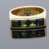 A distinctive Irish gold ring by renowned jewellery designer Rudolph Heltzel, celebrated for his artistic approach to jewellery and his appreciation of fine materials. This elegant creation combines the warmth of gold with the rich colour of tourmalines, reflecting a confident and considered approach to modern jewellery design.