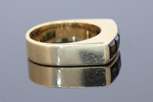 A distinctive Irish gold ring by renowned jewellery designer Rudolph Heltzel, celebrated for his artistic approach to jewellery and his appreciation of fine materials. This elegant creation combines the warmth of gold with the rich colour of tourmalines, reflecting a confident and considered approach to modern jewellery design.