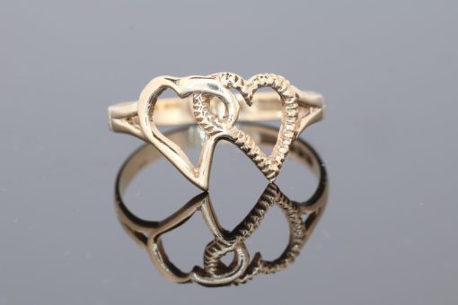 A charming intertwined hearts ring, symbolising connection, affection and enduring bonds. The heart motif has long held a special place in jewellery design, making this an appealing piece to wear as a personal expression of love or to give as a meaningful gift.