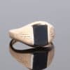 A distinctive vintage Irish signet ring, combining traditional design with the understated elegance of onyx. Signet rings have long been valued for their classic proportions and enduring appeal, making them timeless additions to a jewellery collection.