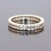 Unusual and elegant, this 18kt white gold ring offers a distinctive interpretation of contemporary fine jewellery. Its innovative two-band design creates a sense of movement and dimension, while the addition of diamonds brings a refined touch of brilliance.