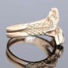 A captivating vintage snake ring, combining the timeless appeal of gold jewellery with the enduring symbolism of the serpent. Throughout jewellery history, snakes have represented renewal, eternity and enduring bonds, making them a particularly evocative motif in decorative jewellery.