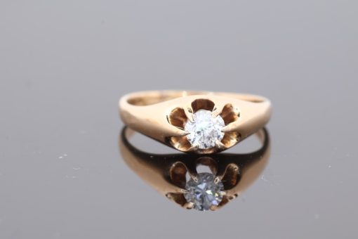 A charming diamond ring that celebrates the enduring appeal of old-cut diamonds and classic gold jewellery. Its single diamond centrepiece offers an elegant simplicity, with the characterful faceting of an old cut lending individuality and a sense of timeless romance to the design.