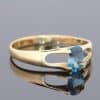 Elegant and distinctive, this 18kt gold ring showcases the captivating appeal of a beautiful teal-coloured gemstone. The rich blue-green hue offers a sophisticated alternative to more traditional gemstone colours, bringing depth and individuality to this fine jewellery piece.