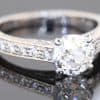 An elegant diamond ring showcasing the distinctive charm of the Old European cut, a style prized for its romantic character and beautifully individual sparkle. Set in platinum, this refined piece combines the enduring appeal of an antique-inspired diamond with intricate detailing and timeless sophistication.