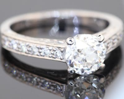 An elegant diamond ring showcasing the distinctive charm of the Old European cut, a style prized for its romantic character and beautifully individual sparkle. Set in platinum, this refined piece combines the enduring appeal of an antique-inspired diamond with intricate detailing and timeless sophistication.