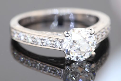 An elegant diamond ring showcasing the distinctive charm of the Old European cut, a style prized for its romantic character and beautifully individual sparkle. Set in platinum, this refined piece combines the enduring appeal of an antique-inspired diamond with intricate detailing and timeless sophistication.
