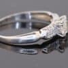 A rare antique diamond ring by Blackensee & Co. of England, dating to circa 1930. Reflecting the elegance of the period, this beautifully detailed jewel combines a central diamond with diamond-set shoulders, creating a sophisticated design with enduring appeal.