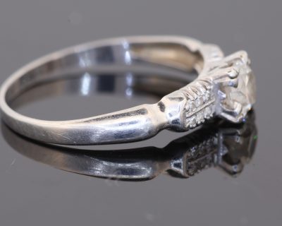 A rare antique diamond ring by Blackensee & Co. of England, dating to circa 1930. Reflecting the elegance of the period, this beautifully detailed jewel combines a central diamond with diamond-set shoulders, creating a sophisticated design with enduring appeal.