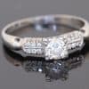 A rare antique diamond ring by Blackensee & Co. of England, dating to circa 1930. Reflecting the elegance of the period, this beautifully detailed jewel combines a central diamond with diamond-set shoulders, creating a sophisticated design with enduring appeal.