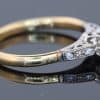 Dating to the antique period, this diamond engagement ring brings together the romantic character of an old-cut diamond and the enduring elegance of 18kt gold. Its classic design, enhanced by pavé-set shoulders, offers a beautiful expression of antique-inspired craftsmanship and timeless appeal.