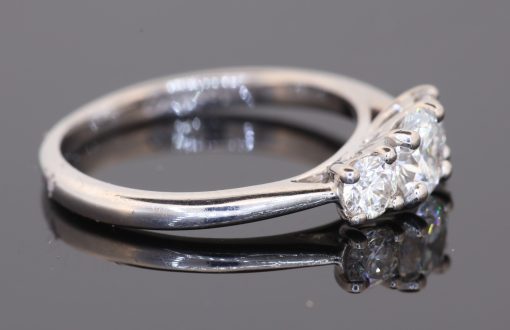 An elegant diamond engagement ring combining classic design with the brilliance of a substantial diamond setting. Crafted in 18kt white gold, this ring brings together a beautifully graded centre diamond and complementary diamonds to create a timeless expression of elegance.