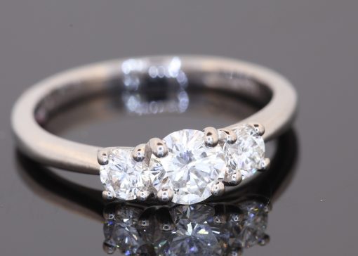 An elegant diamond engagement ring combining classic design with the brilliance of a substantial diamond setting. Crafted in 18kt white gold, this ring brings together a beautifully graded centre diamond and complementary diamonds to create a timeless expression of elegance.
