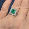 A superb Edwardian emerald and diamond ring, dating to circa 1905 and set in platinum. At its centre is a magnificent 1.5-carat step-cut emerald, distinguished by its exceptional colour and framed by a graceful surround of antique-cut diamonds. The combination of vivid emerald and the cool brilliance of platinum is quintessentially Edwardian, creating a jewel of considerable elegance and character.