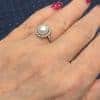 An extremely rare natural pearl and diamond cluster ring, made in Paris circa 1910. The ring centres on a beautiful natural pearl, accompanied by a Gem Lab certificate confirming its natural origin. The combination of natural pearl, diamonds and 18kt gold is characteristic of the refined French jewellery of the early 20th century, when natural pearls were among the most coveted gems in fine jewellery.