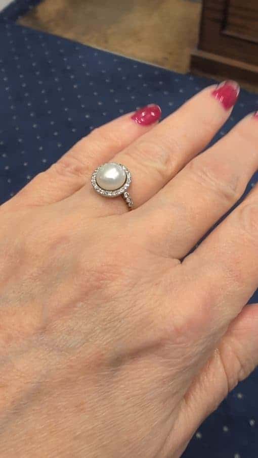 An extremely rare natural pearl and diamond cluster ring, made in Paris circa 1910. The ring centres on a beautiful natural pearl, accompanied by a Gem Lab certificate confirming its natural origin. The combination of natural pearl, diamonds and 18kt gold is characteristic of the refined French jewellery of the early 20th century, when natural pearls were among the most coveted gems in fine jewellery.