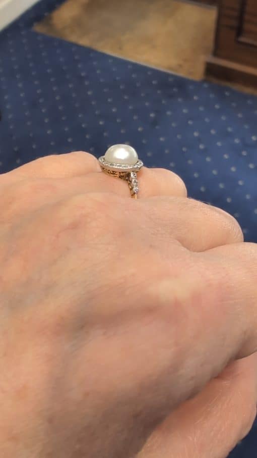 An extremely rare natural pearl and diamond cluster ring, made in Paris circa 1910. The ring centres on a beautiful natural pearl, accompanied by a Gem Lab certificate confirming its natural origin. The combination of natural pearl, diamonds and 18kt gold is characteristic of the refined French jewellery of the early 20th century, when natural pearls were among the most coveted gems in fine jewellery.